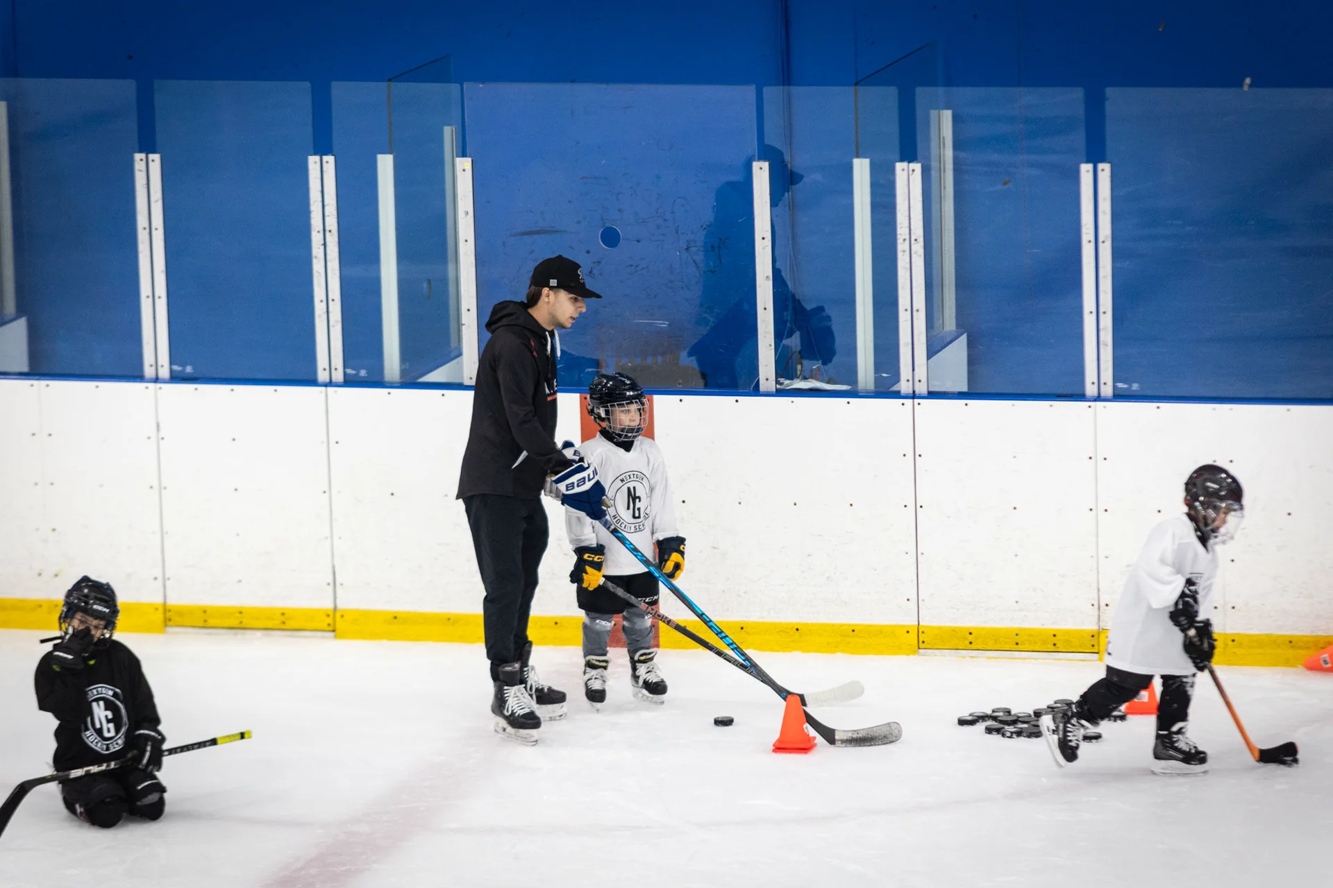 Coach Joe DeMarco coaching young NextGen players